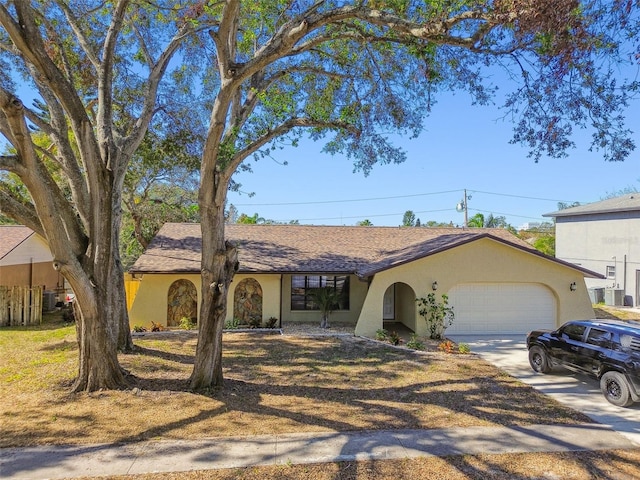 ranch-style home featuring a garage