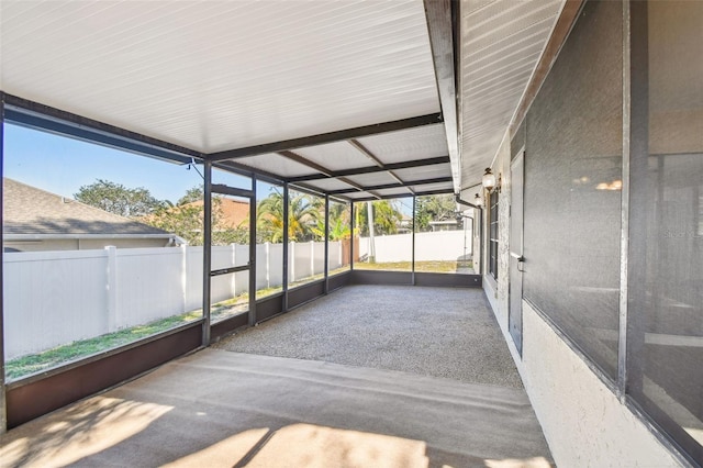 unfurnished sunroom featuring plenty of natural light