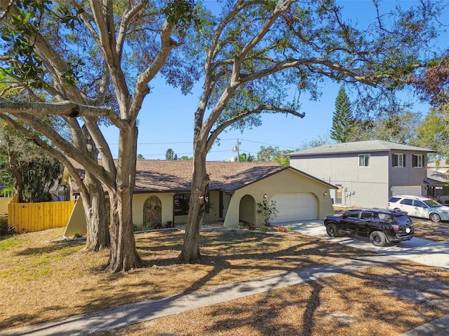 single story home featuring a garage