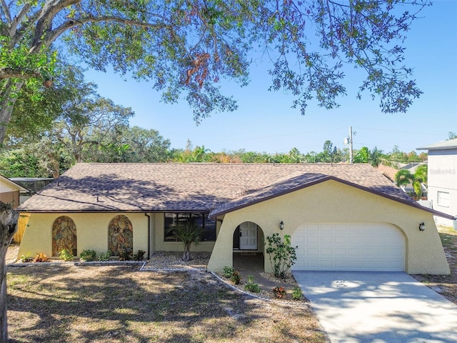 ranch-style home with a garage