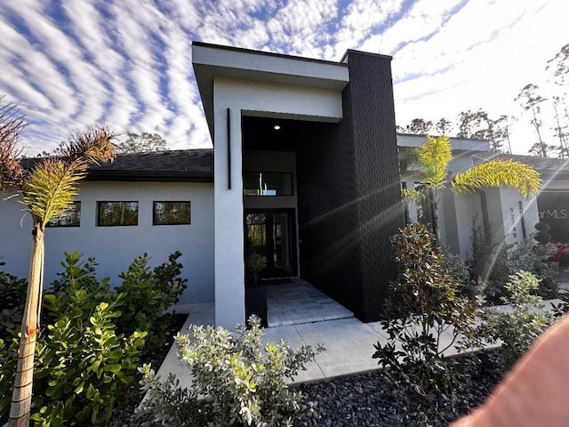 property entrance with a patio area