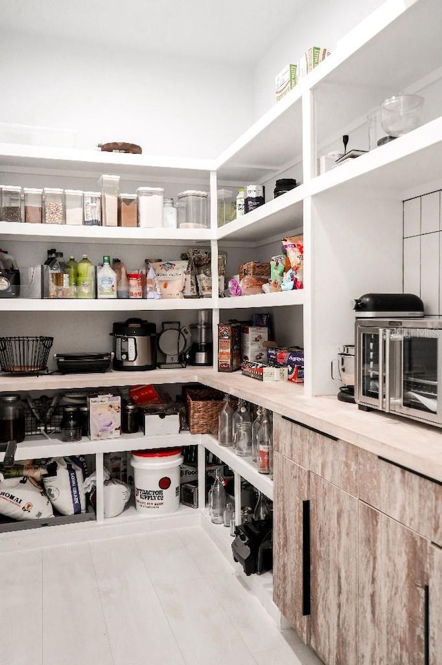 storage area featuring a toaster