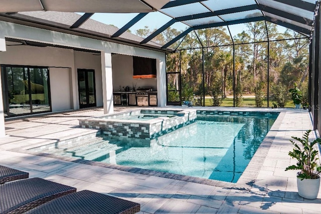 view of swimming pool featuring a patio, area for grilling, a lanai, and a pool with connected hot tub