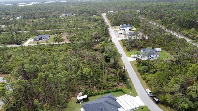 bird's eye view with a view of trees