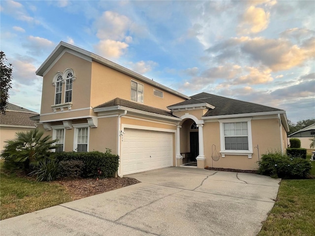 view of front of home with a garage