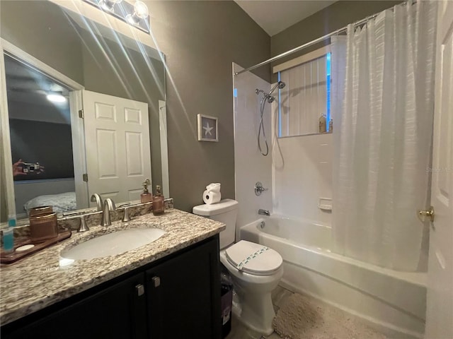 full bathroom with shower / bath combination with curtain, toilet, and vanity