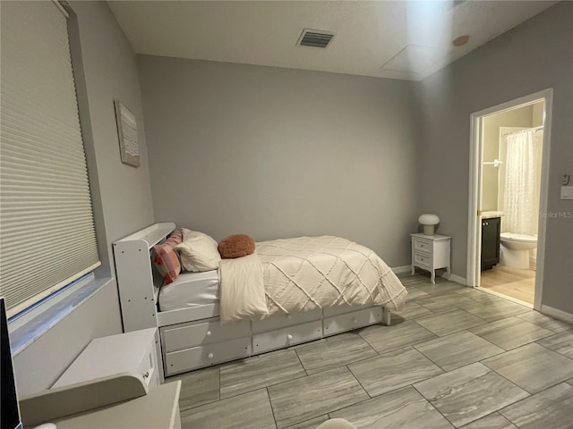 bedroom with ensuite bathroom