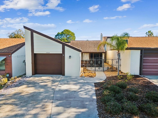 ranch-style house featuring a garage