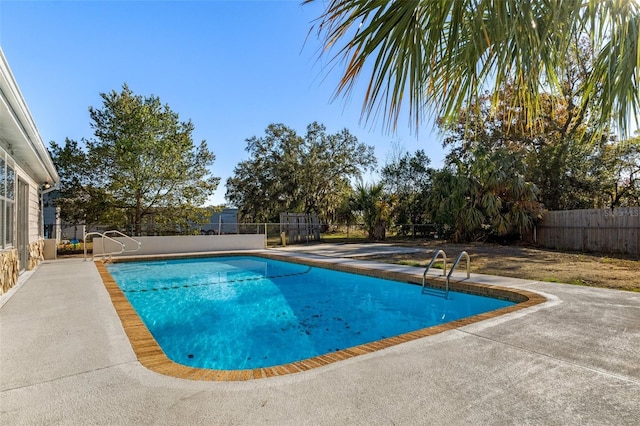 view of pool featuring a patio