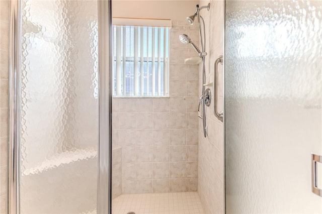 bathroom featuring an enclosed shower