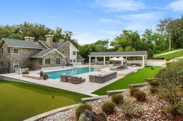 view of swimming pool featuring a gazebo, an outdoor hangout area, and a patio area