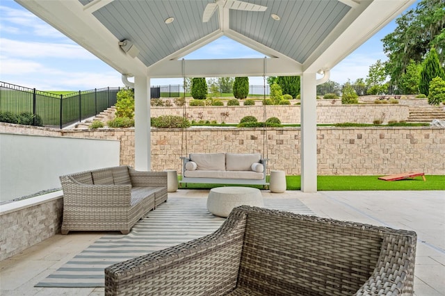 view of patio / terrace featuring outdoor lounge area, a gazebo, and ceiling fan