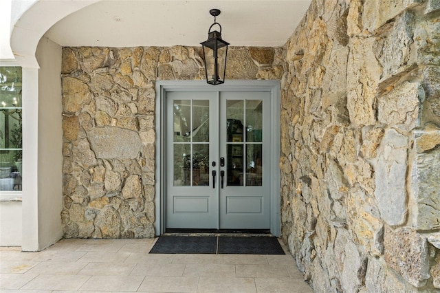 doorway to property featuring french doors