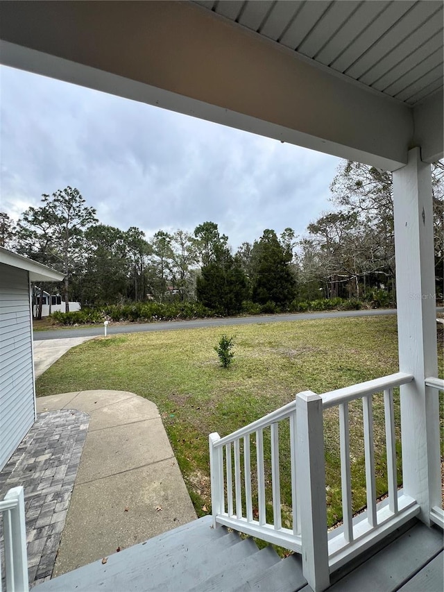 view of yard with a porch