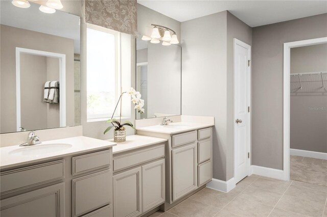 bathroom with tile patterned floors and vanity