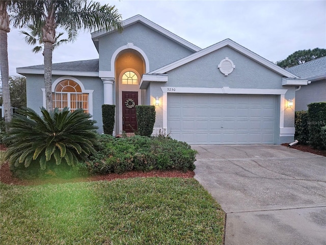 view of front of property featuring a garage