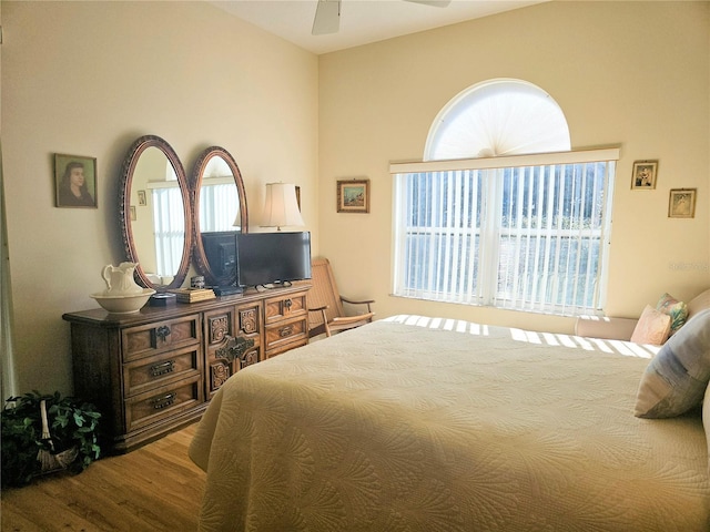 bedroom featuring ceiling fan and hardwood / wood-style flooring