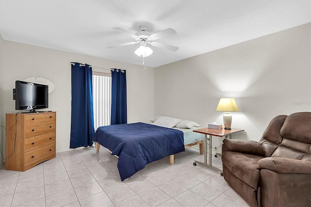 bedroom featuring light tile patterned flooring and ceiling fan