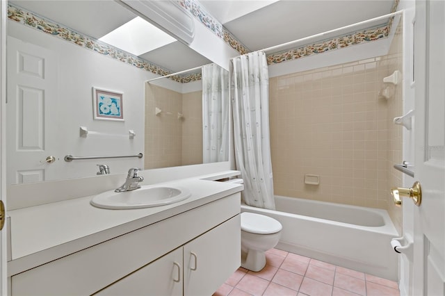 full bath featuring toilet, shower / tub combo, vanity, and tile patterned floors