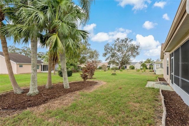 view of yard featuring a residential view