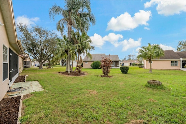 view of yard with a residential view