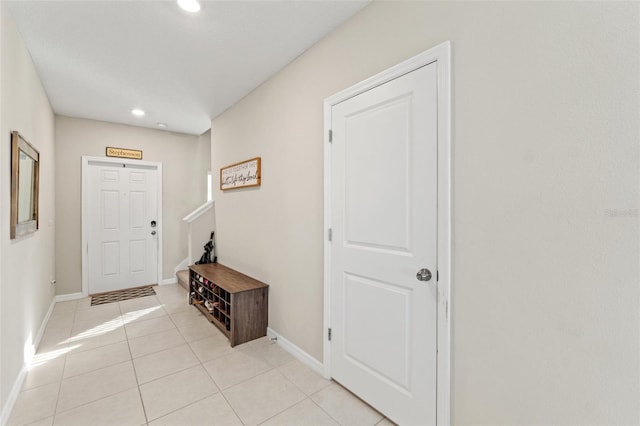 foyer entrance featuring light tile patterned floors