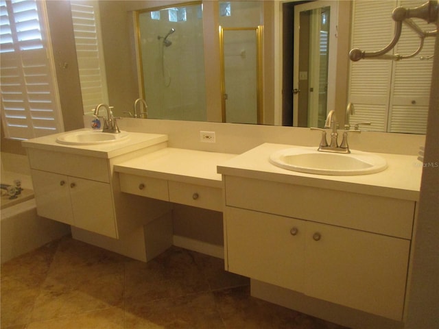 bathroom featuring tile patterned flooring, vanity, and independent shower and bath