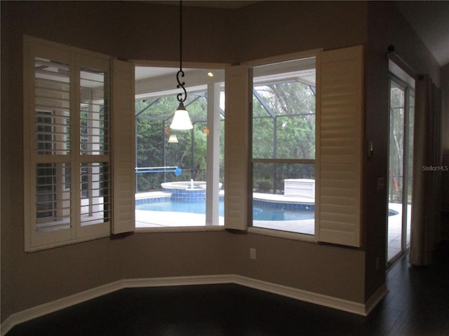 unfurnished dining area with hardwood / wood-style flooring