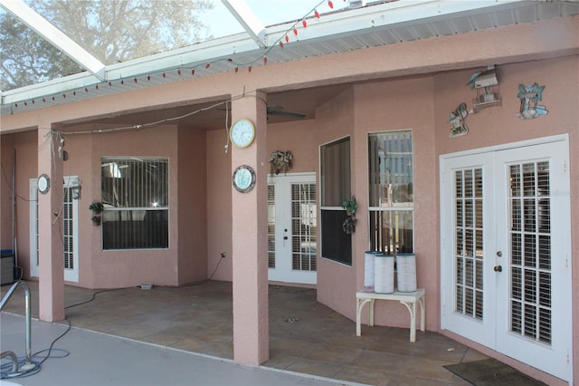 exterior space featuring a lanai and french doors