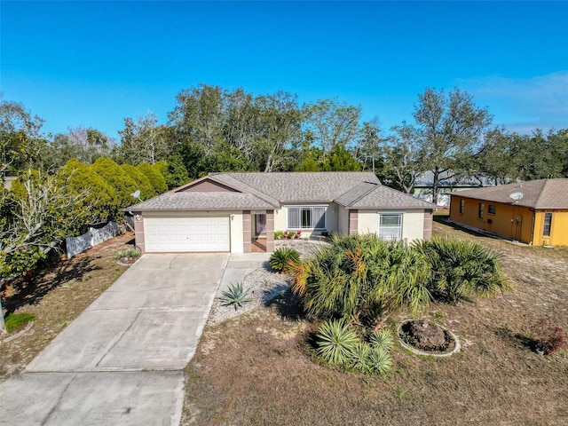 single story home with a garage