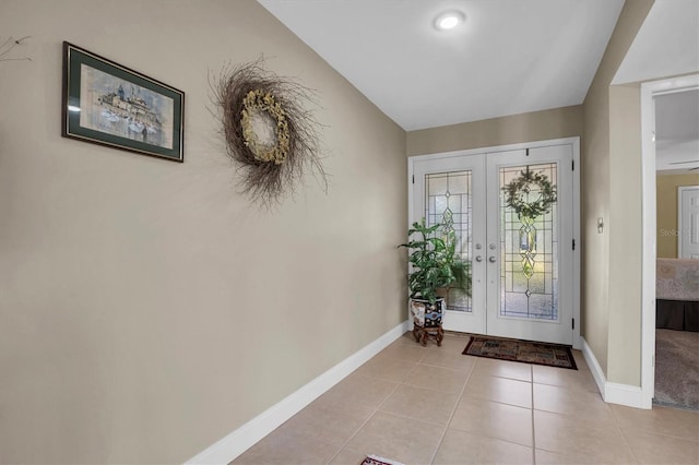 tiled entrance foyer with french doors