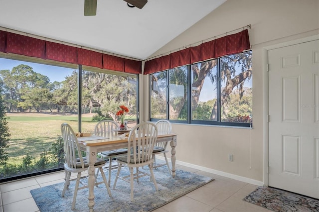 sunroom featuring vaulted ceiling and ceiling fan