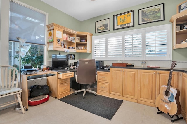 office space with light tile patterned floors