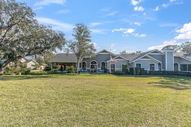 view of front of house with a front lawn