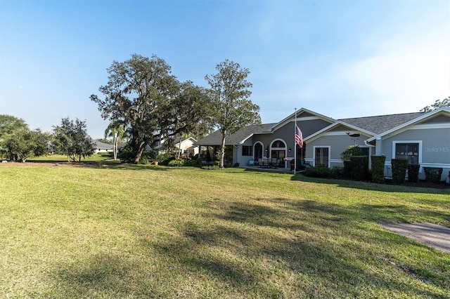 view of front of home featuring a front lawn