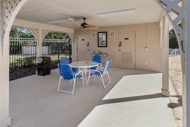 view of patio featuring ceiling fan