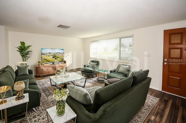 living room featuring dark hardwood / wood-style flooring