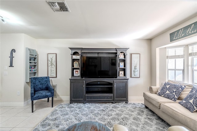 living room featuring light tile patterned flooring