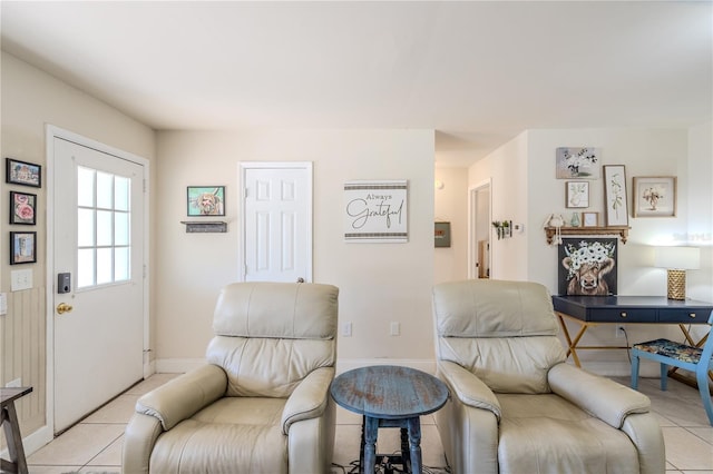 living area with light tile patterned floors