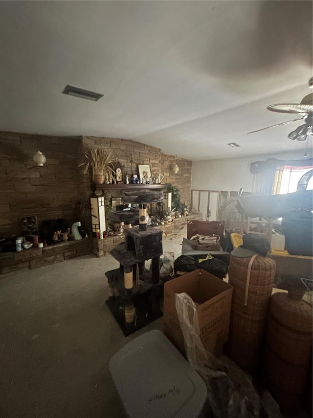 miscellaneous room featuring ceiling fan and lofted ceiling