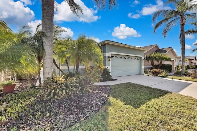 view of front facade with a front lawn and a garage