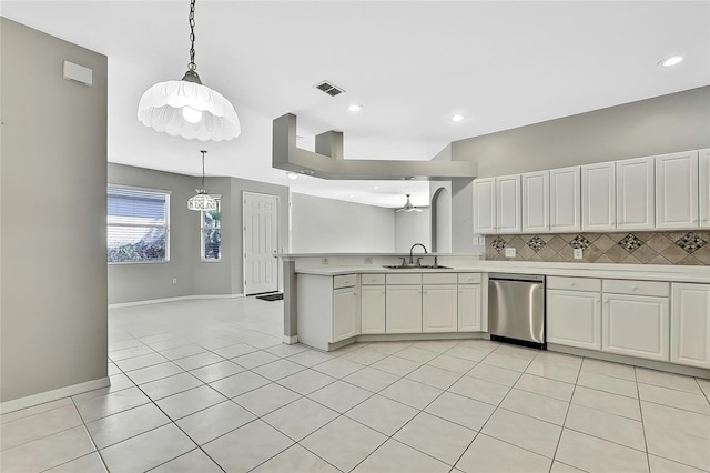 kitchen featuring stainless steel dishwasher, light tile patterned floors, decorative backsplash, white cabinets, and sink