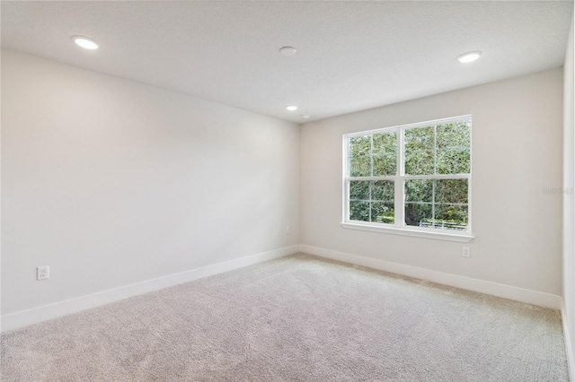 empty room featuring carpet floors