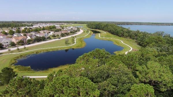 drone / aerial view with a water view