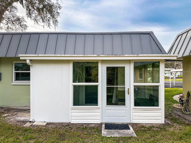 view of home's exterior featuring a sunroom