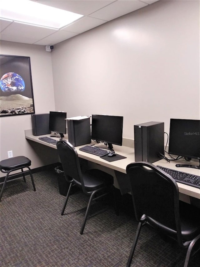 office space with carpet flooring and a drop ceiling