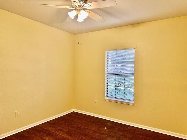 unfurnished room featuring ceiling fan and wood-type flooring