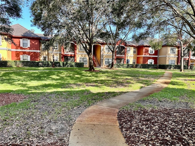 exterior space featuring a front lawn