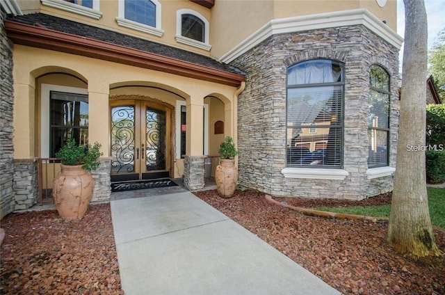 entrance to property featuring french doors