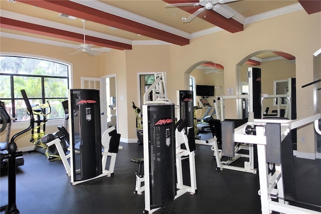 exercise room with ceiling fan and ornamental molding